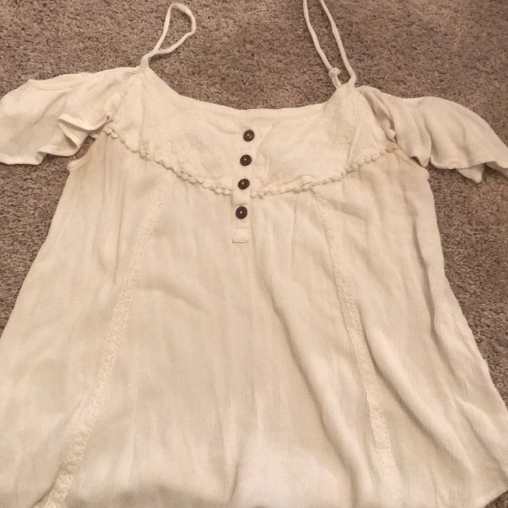 Woman’s cream blouse